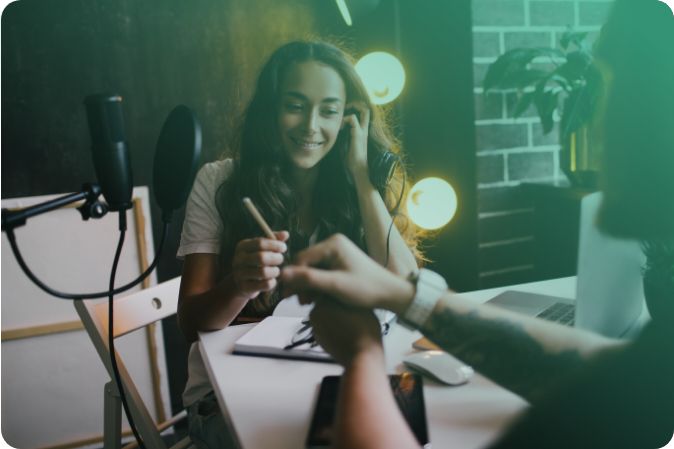 woman with microphone creating interview transcript