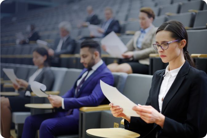 Audience reading documents